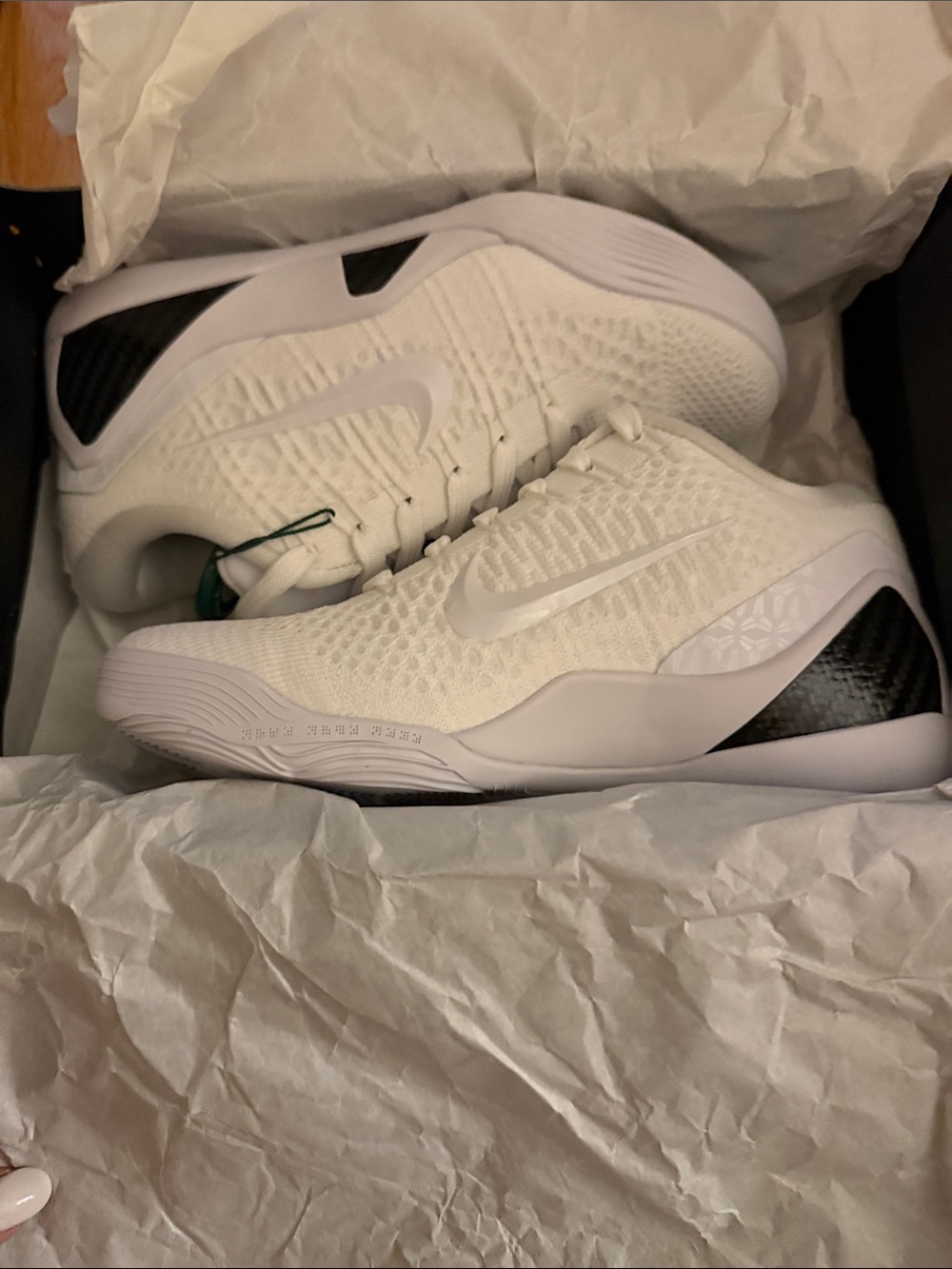 Nike Men’s White and Black Flyknit Athletic Shoes